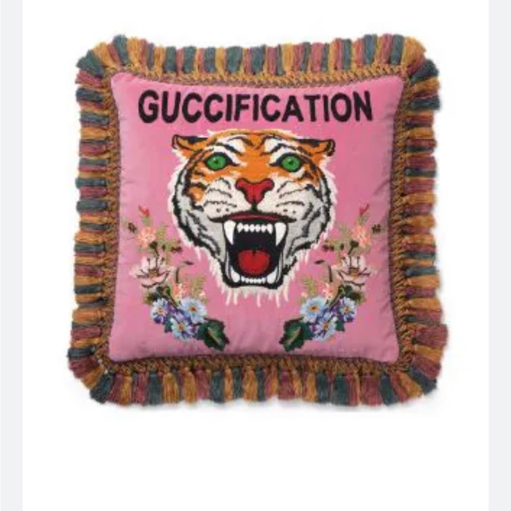 Gucci’s pink velvet cushion entirely hand-embroidered with a multitude of motifs